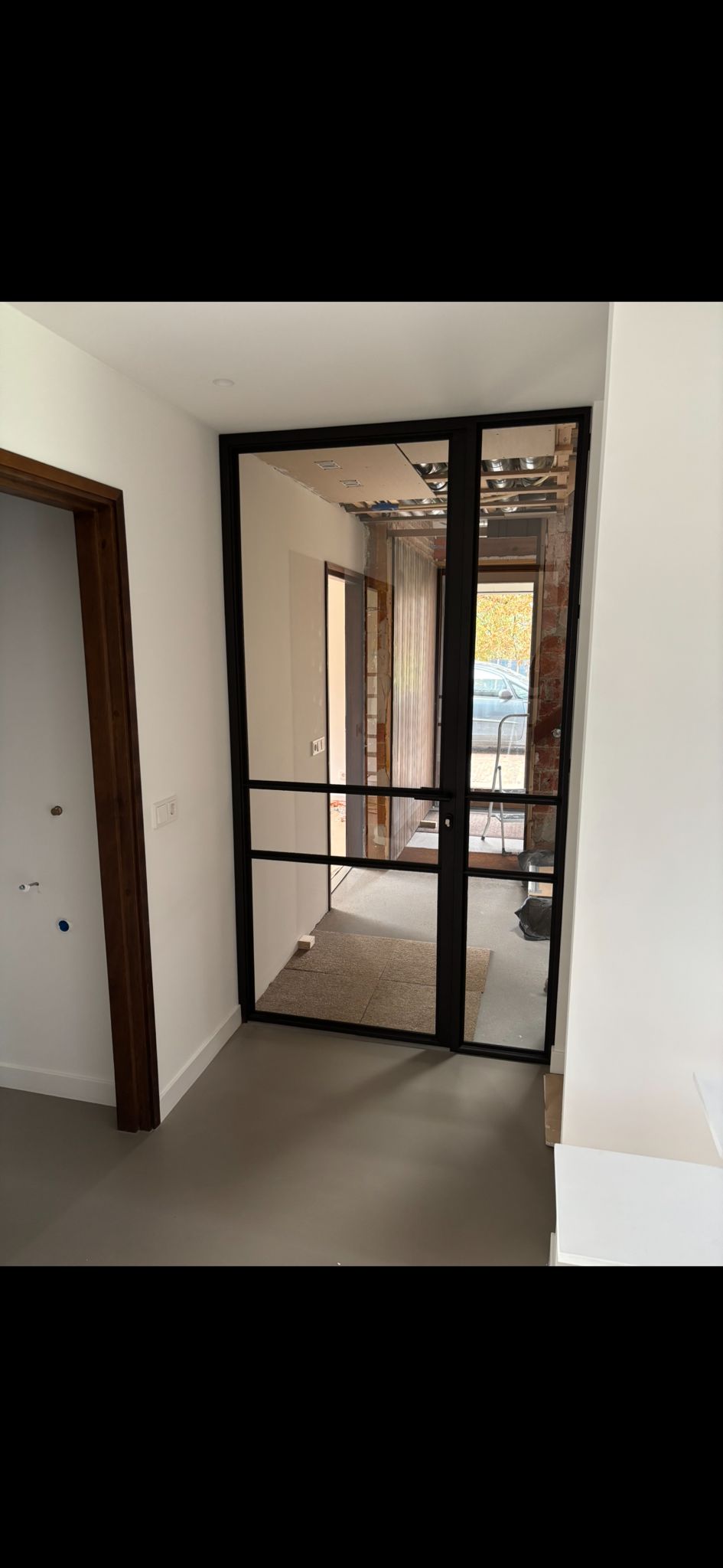 Stalen Schuifdeuren Verwerkt in Plafond en Keukenwand - Woerden 2025