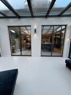 Stalen glazen maatwerkdeur met rond accent